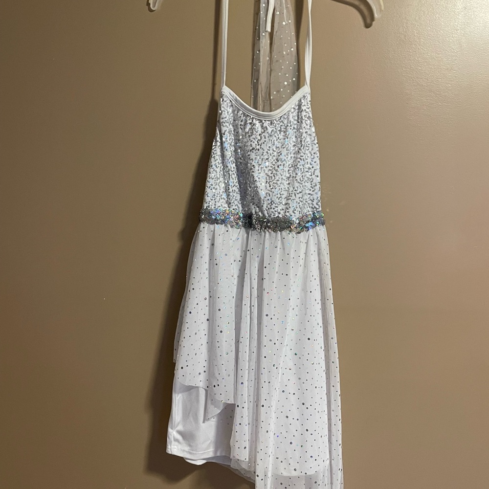 Beautiful dance costume used once. With shorts and a sheer asymmetrical skirt
